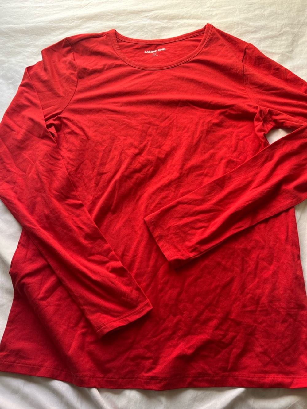 Red long-sleeve shirt